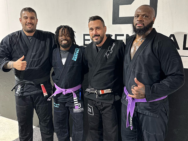 four Jiu Jitsu coaches